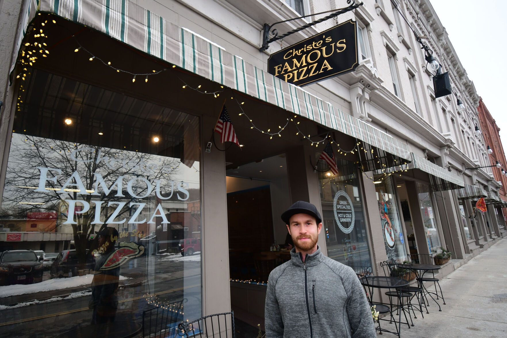 Duncan stands outside his restaurant